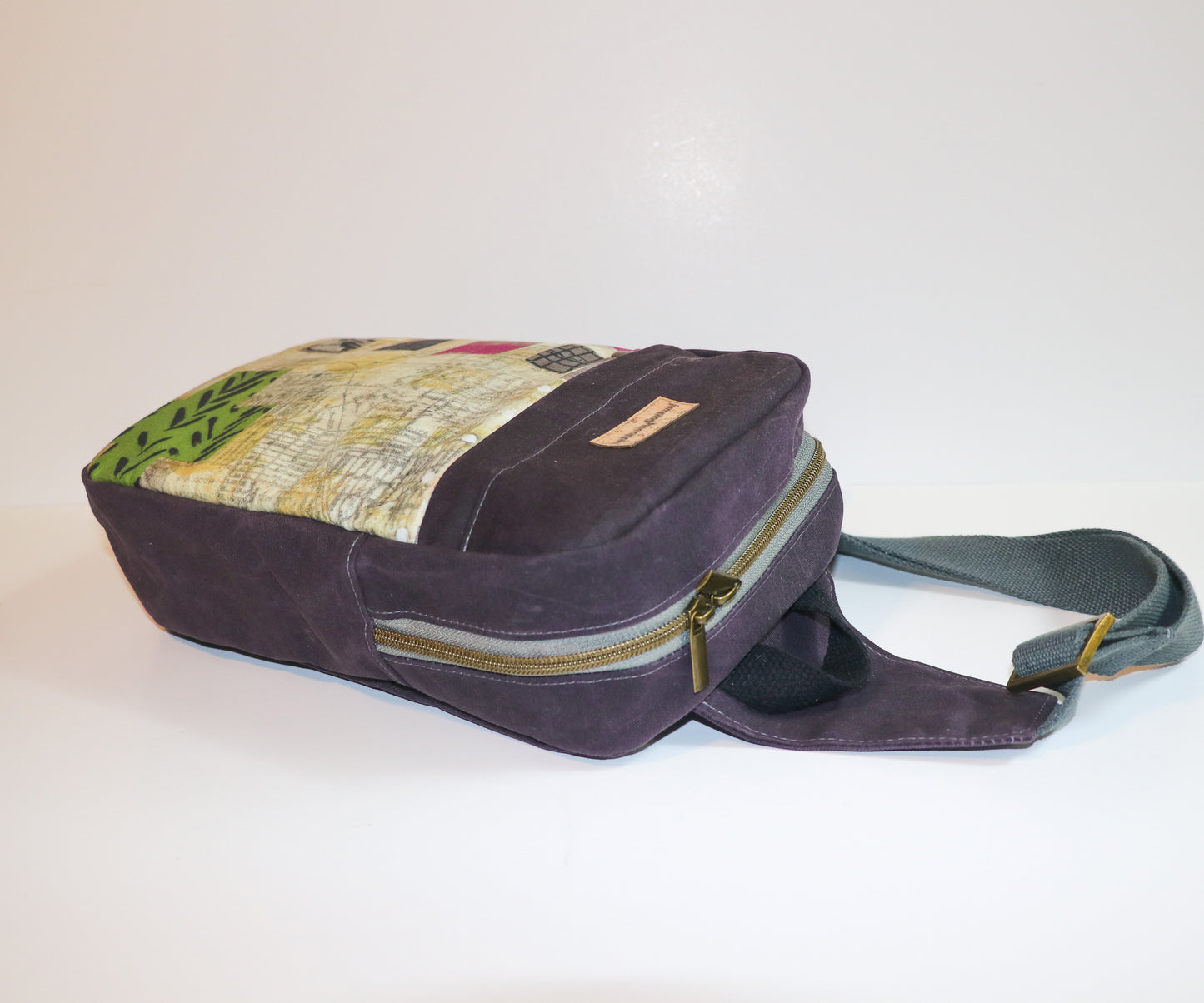 sling backpack laying flat