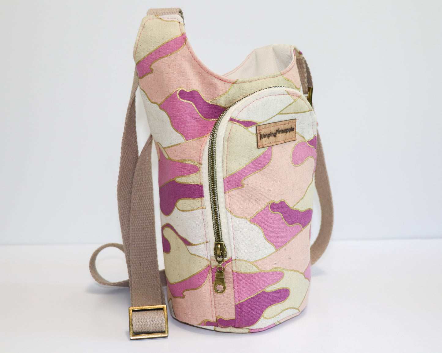 magenta and coral print water bottle sling, side view