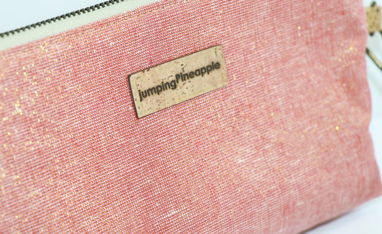 pink tones floral with dusty rose metallic linen wristlet, back view showing sparkles in the metallic linen