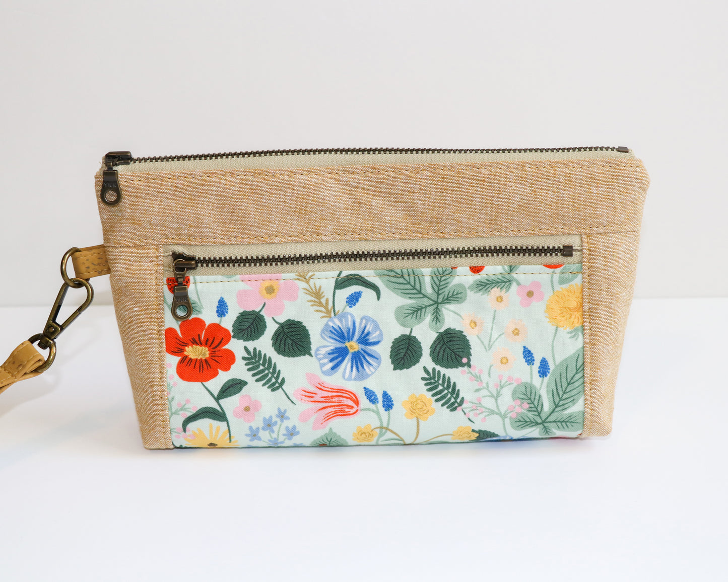 mint floral and linen wristlet, front view