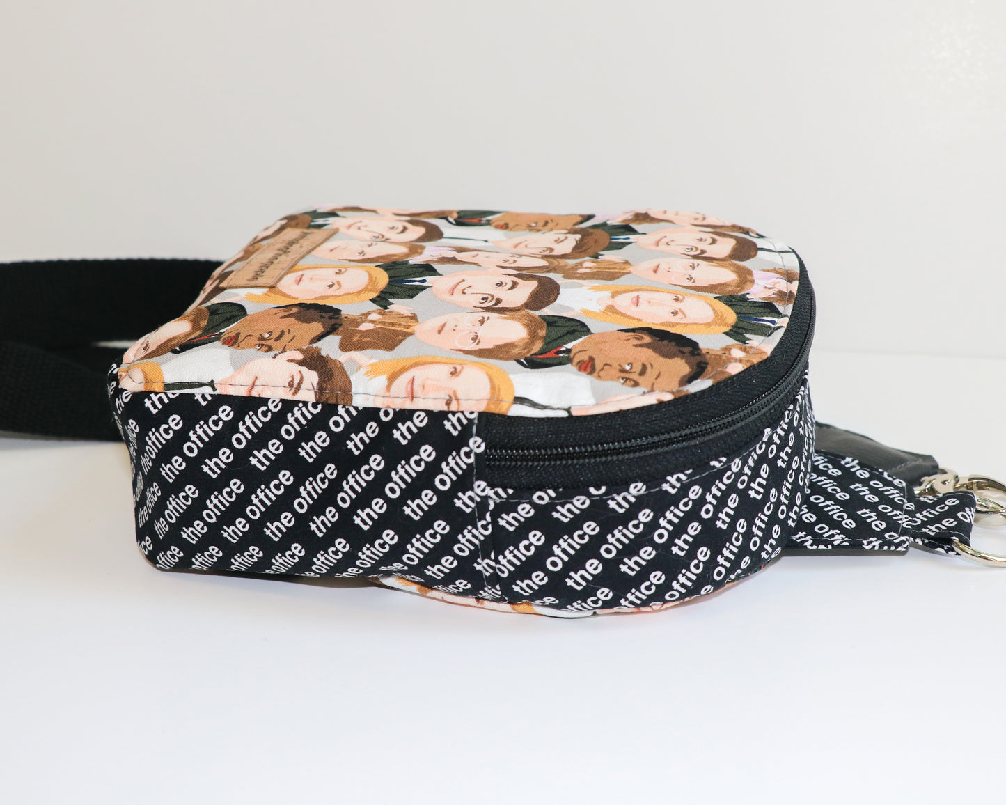 The Office characters mini backpack sling, side view