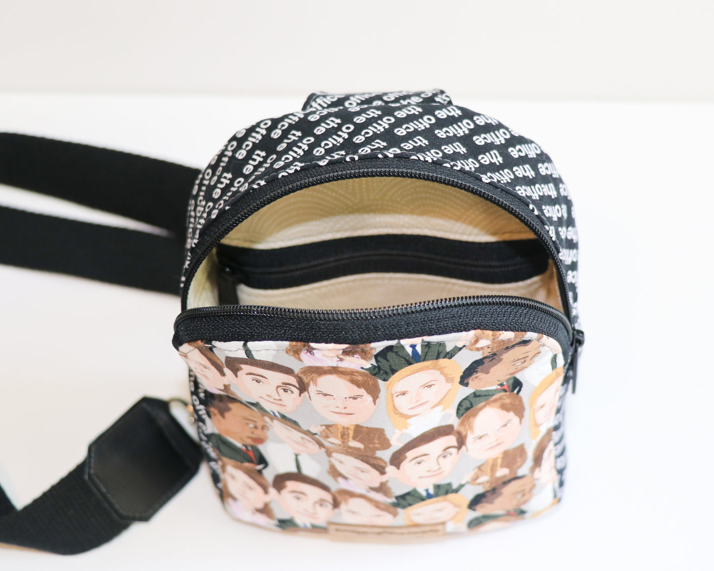 The Office characters mini backpack sling, inside view