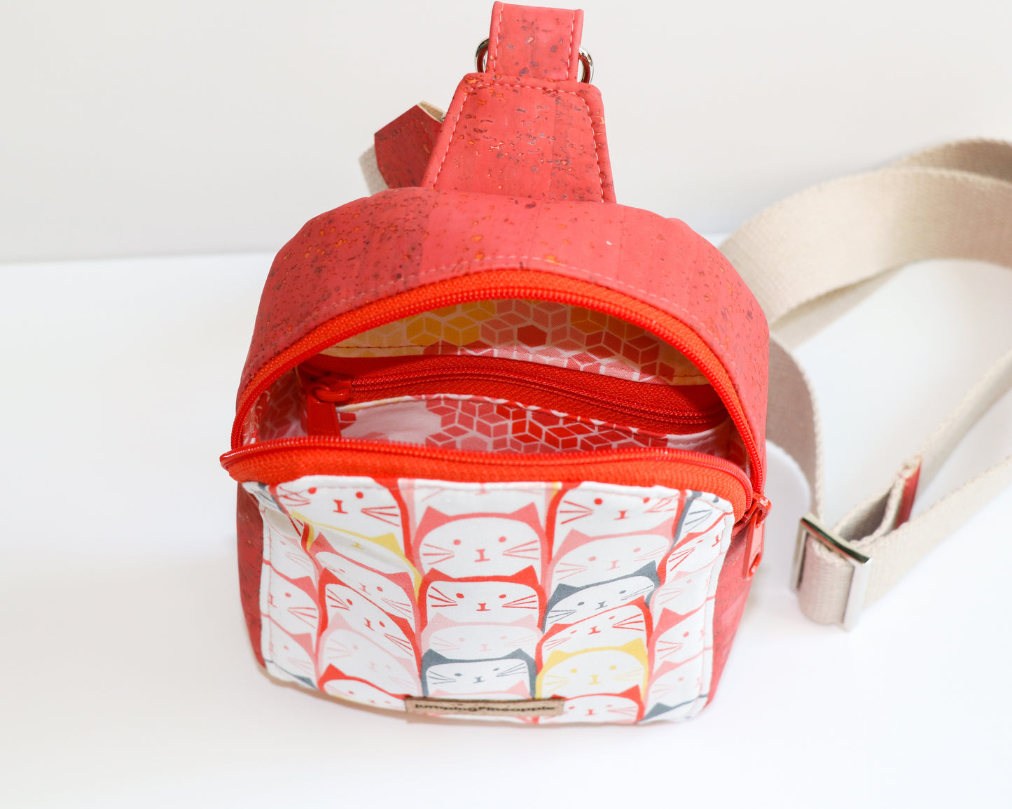 coral cats mini backpack sling, inside view