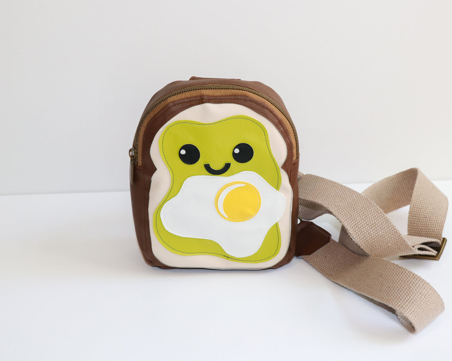 avocado toast mini backpack sling, front view