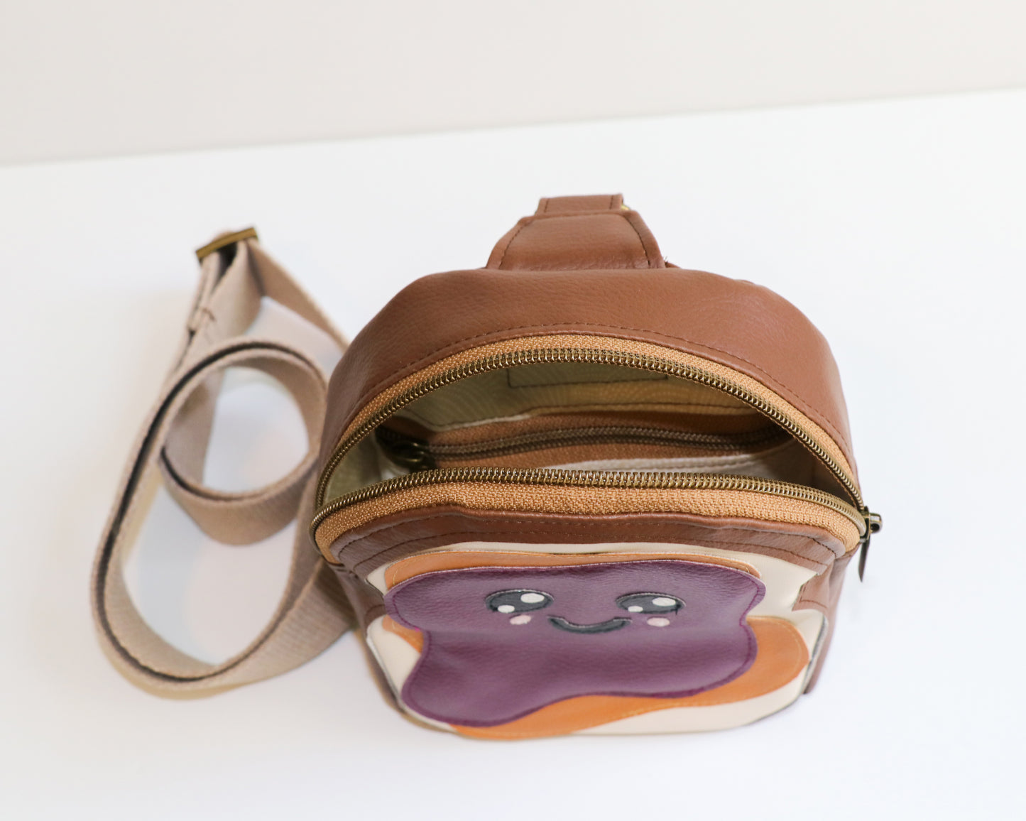 PB & J mini backpack sling, top and inside view