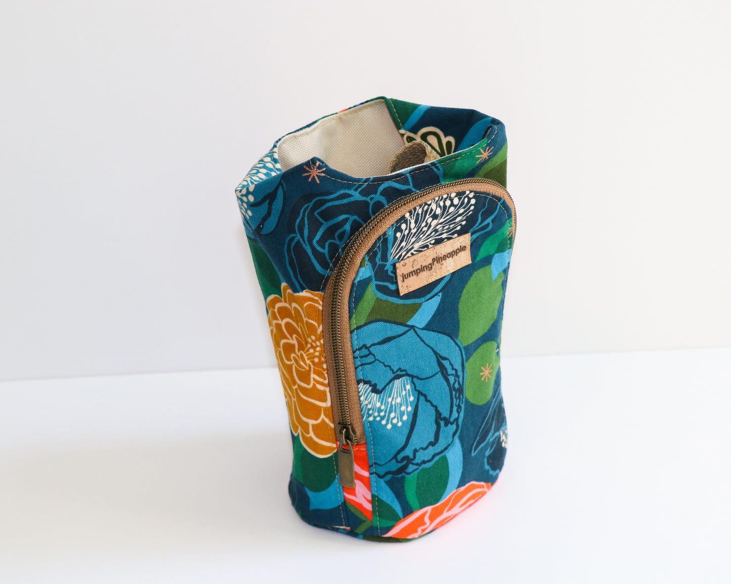 navy canvas with big vold floral print water bottle sling, front view