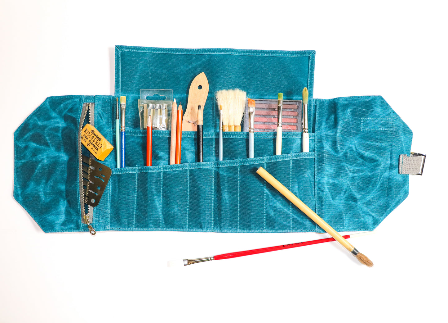 regular teal artist roll, inside view with art supplies