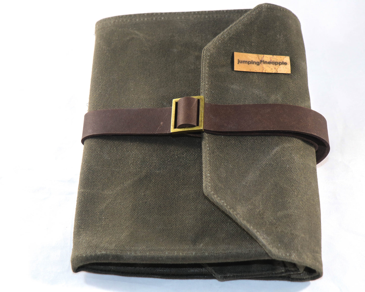 dark brown artist roll with leather strap