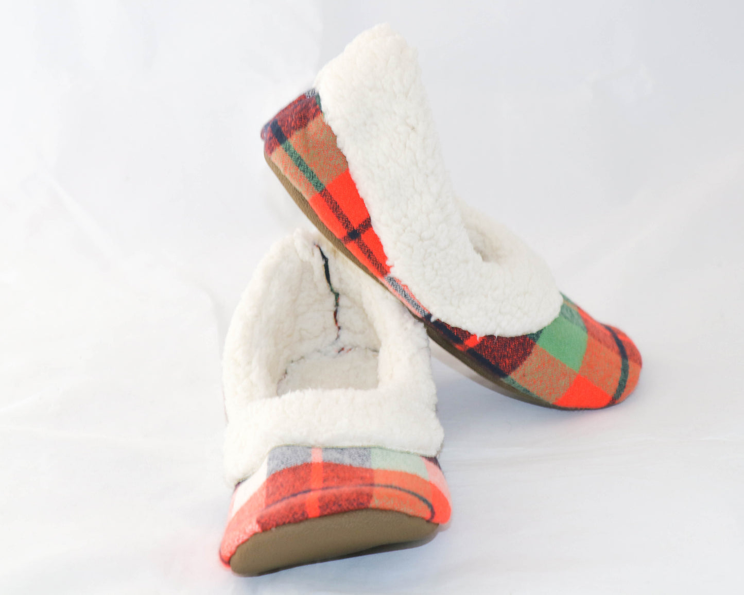 orange and green flannel slippers with cream sherpa inside