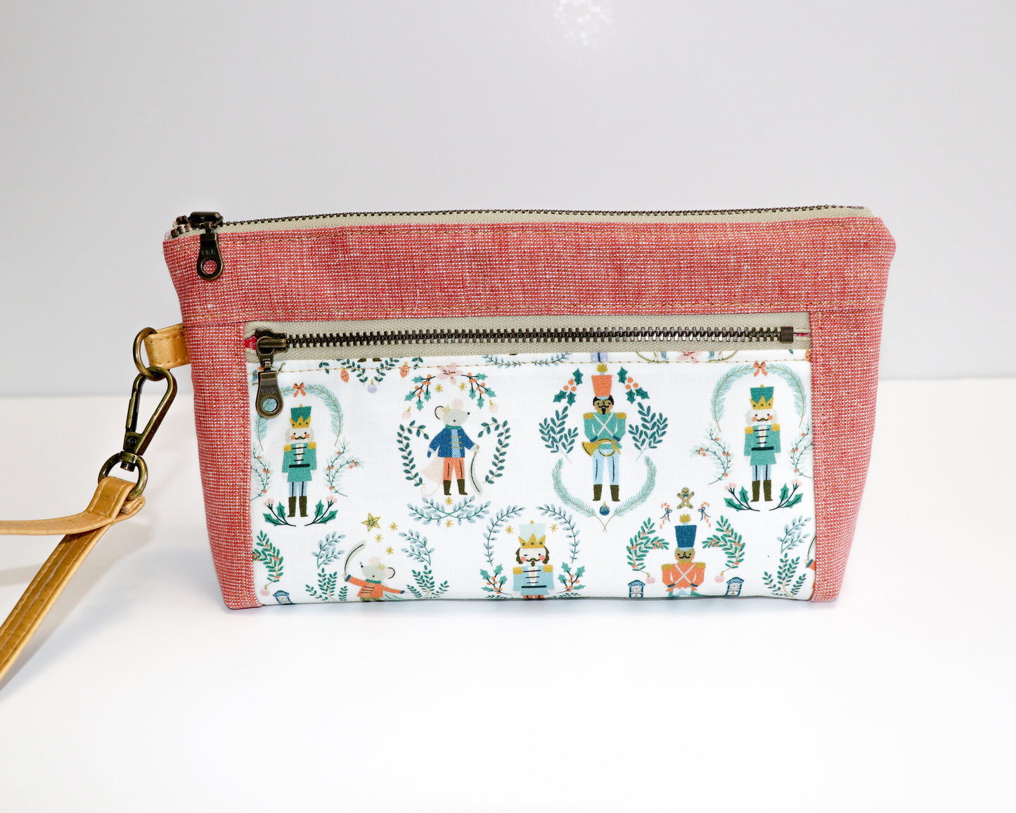 Nutcracker print and rose metallic linen wristlet