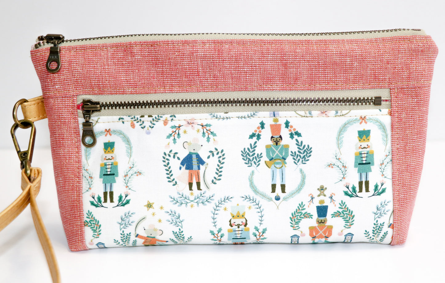 Nutcracker print and rose metallic linen wristlet
