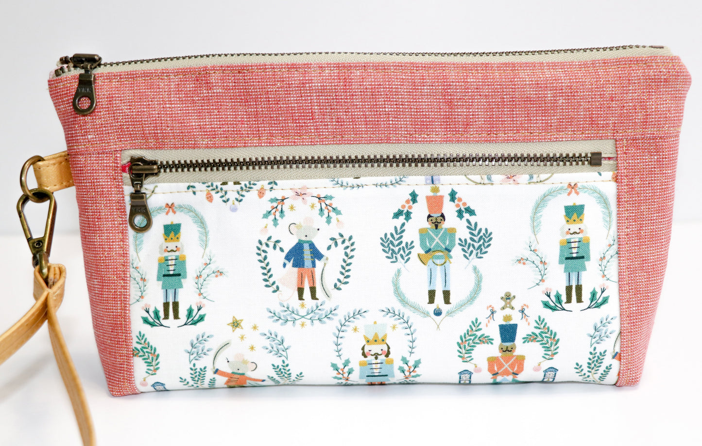 Nutcracker print and rose metallic linen wristlet