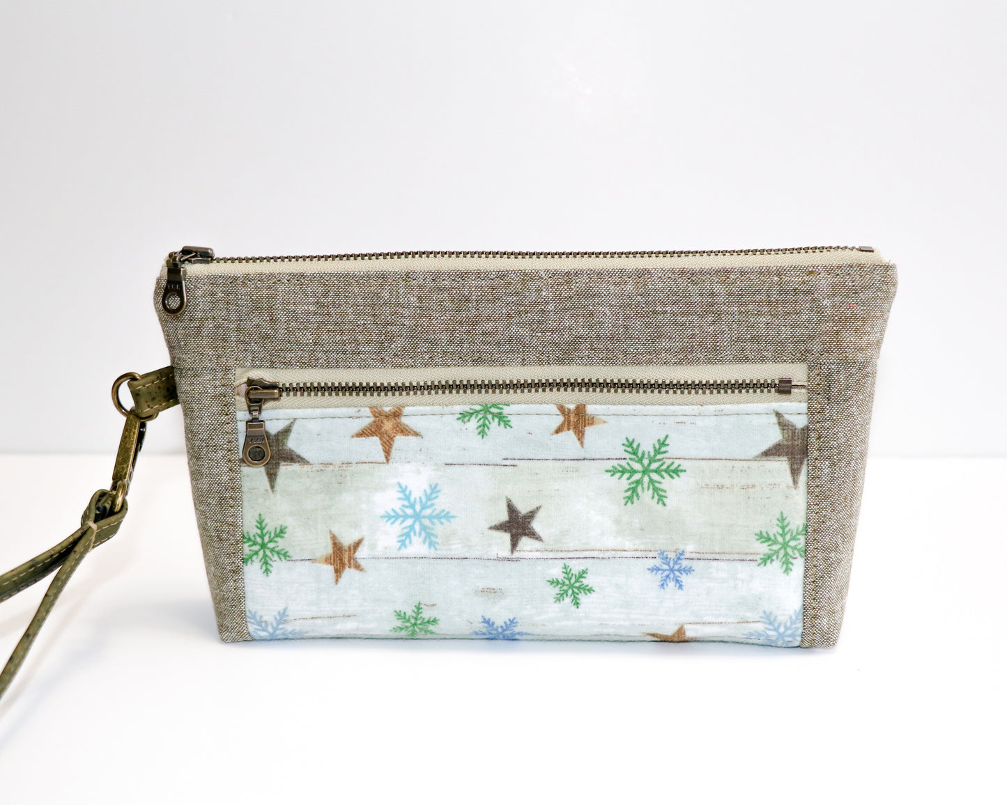 flannel stars and olive linen wristlet