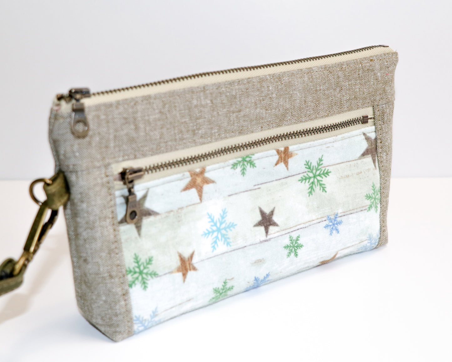 flannel stars and olive linen wristlet