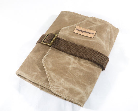 tan waxed canvas artist roll, front view