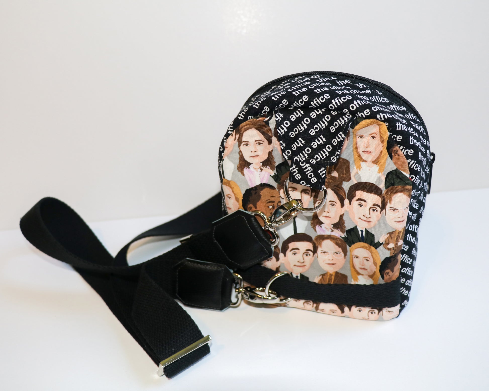 The Office characters mini backpack sling, back view