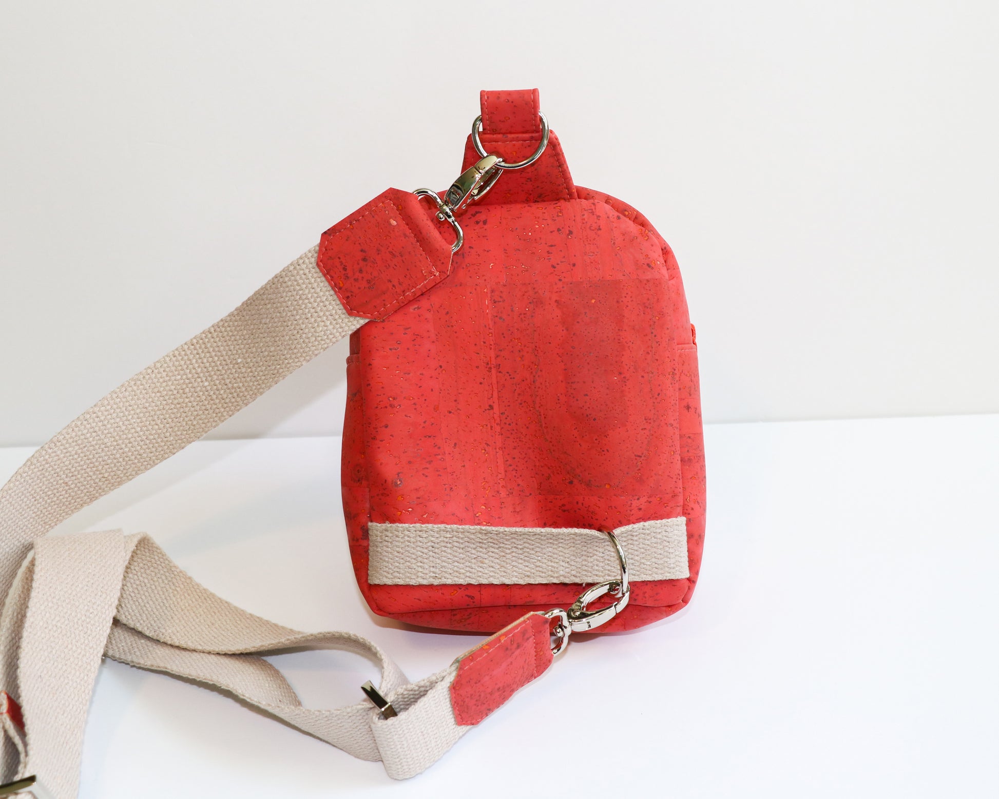 coral cats mini backpack sling, back view