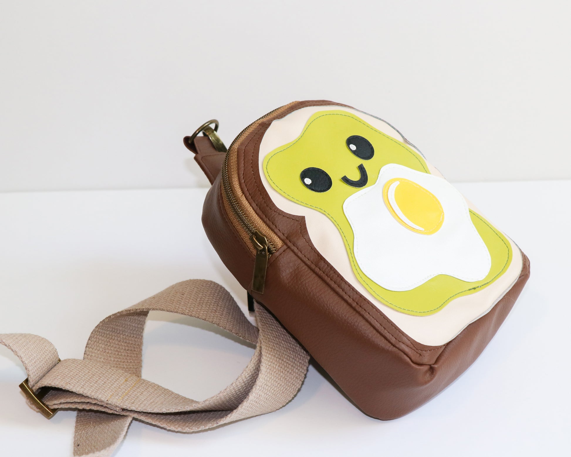 avocado toast mini backpack sling, side view