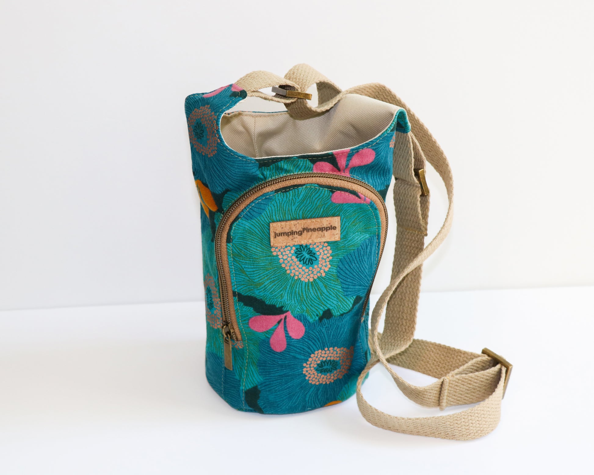 teal and blue floral water bottle sling, front view