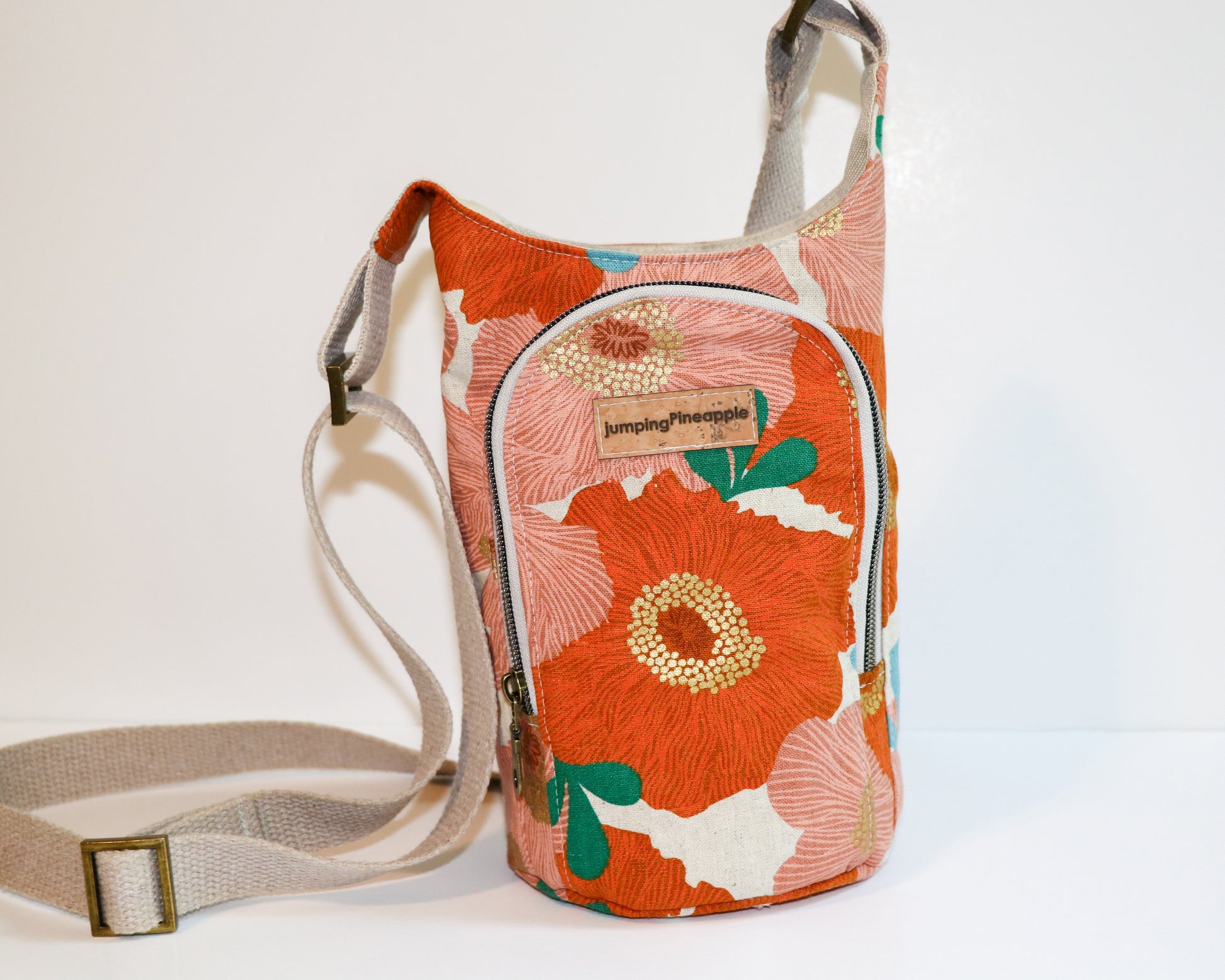 coral floral water bottle sling, front view