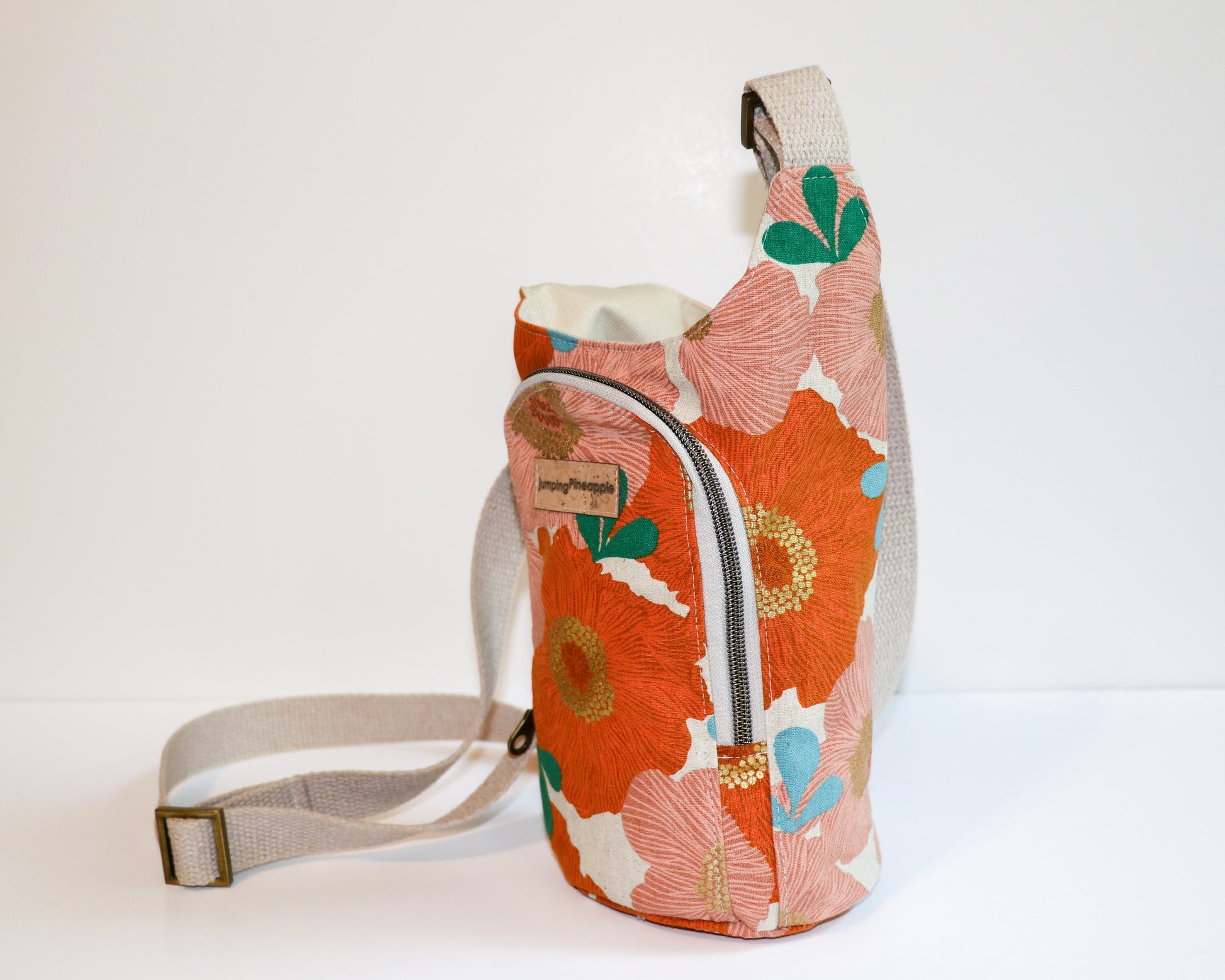 coral floral water bottle sling, side view