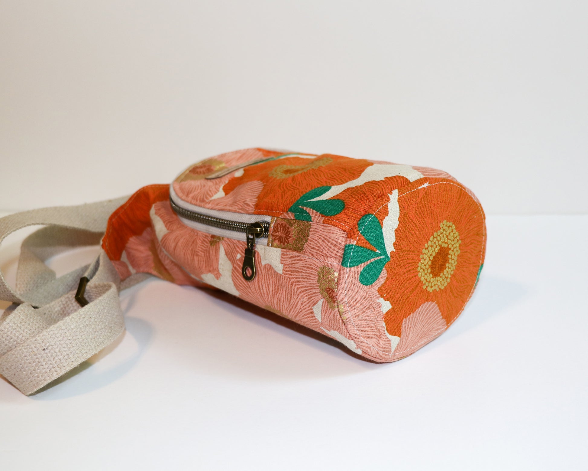 coral floral water bottle sling, bottom view