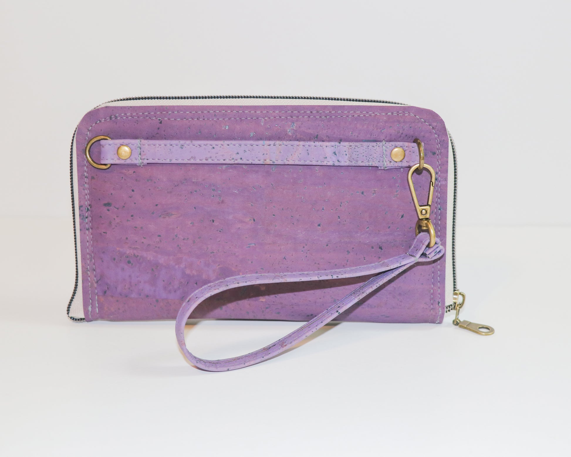 purple clutch wallet, back view with wristlet strap