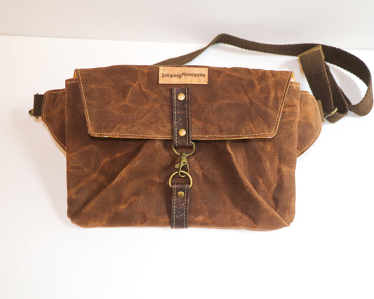 brown waxed canvas belt bag, front view