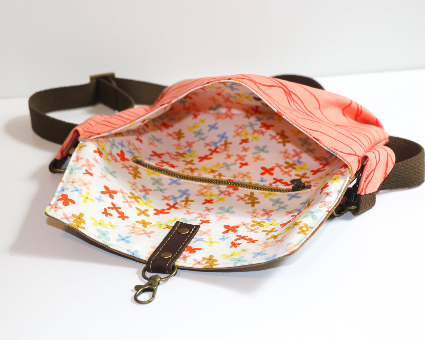 coral canvas with brown waxed canvas flap belt bag, inside view