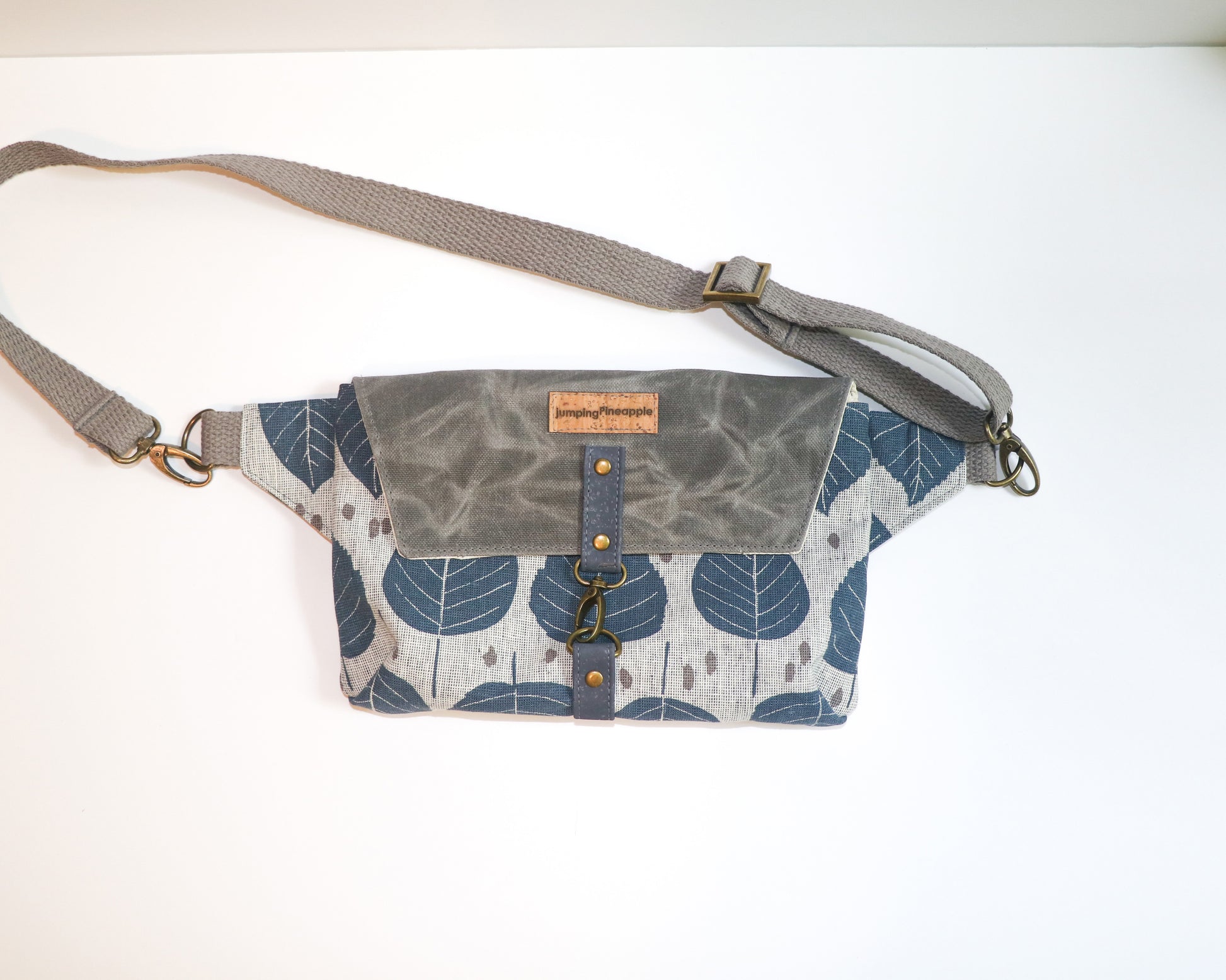 leaf print blue and grey belt bag, front view