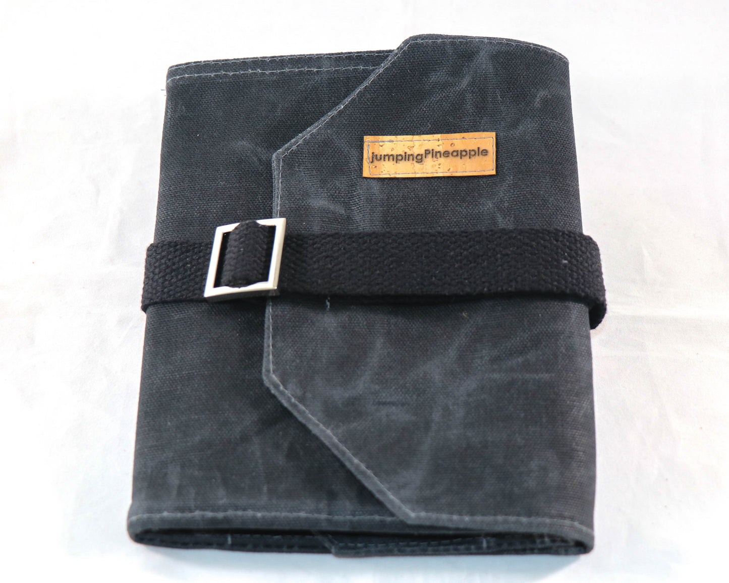 black waxed canvas artist roll, closed