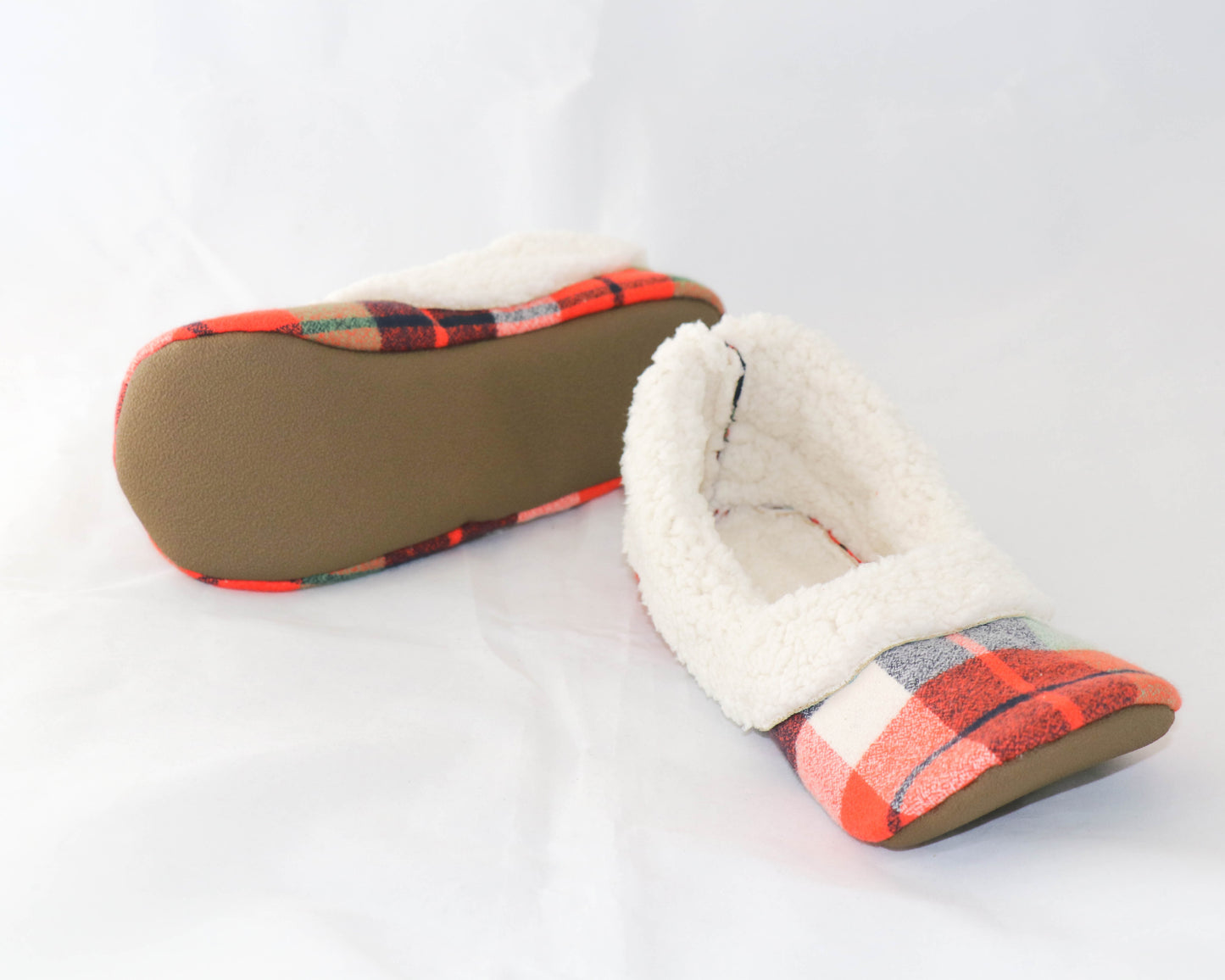 orange and green flannel slippers with cream sherpa inside and brown neoprene soles